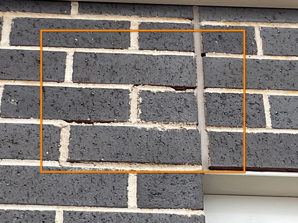Voids and holes left in the brick mortar joints, found during a pre-handover inspection in Bacchus Marsh