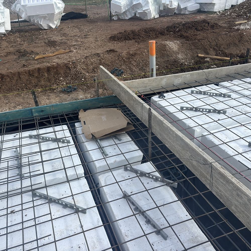 Steel carrying mud and loose rust that must come off before concrete, found during a slab inspection in Maddingley